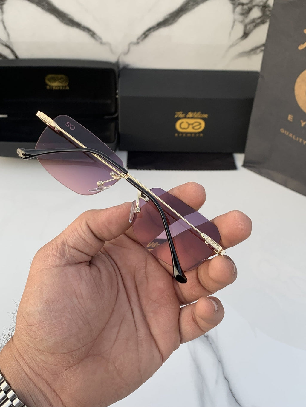 The wilson 2329 gold purple